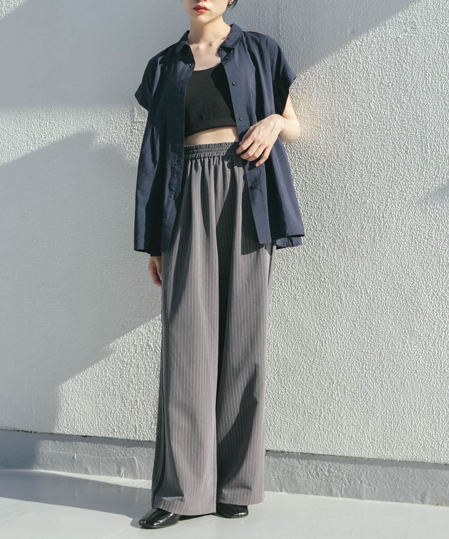 KBF sleeveless stack flare blouse