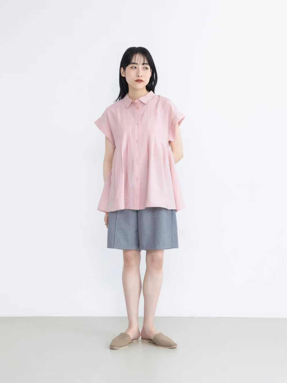 KBF sleeveless stack flare blouse