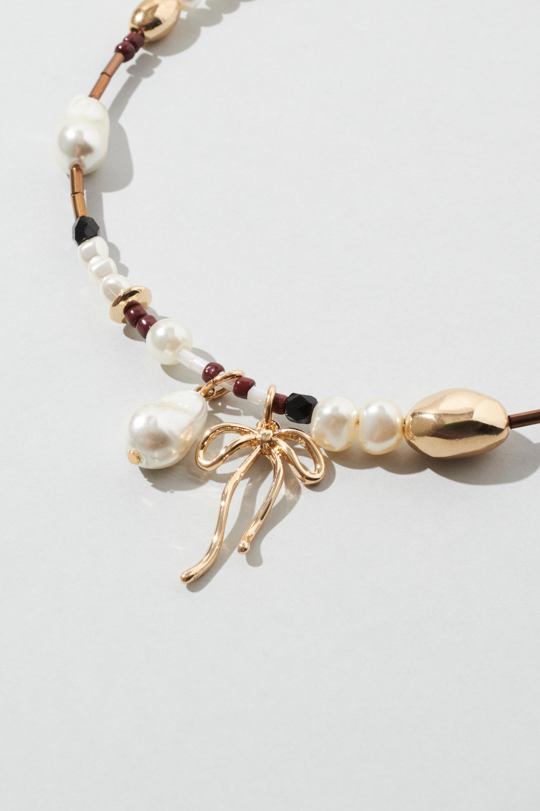 GOLDY multi bead neckcuff [BLACK/BROWN]