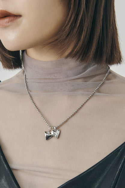 GOLDY metal twins heart necklace