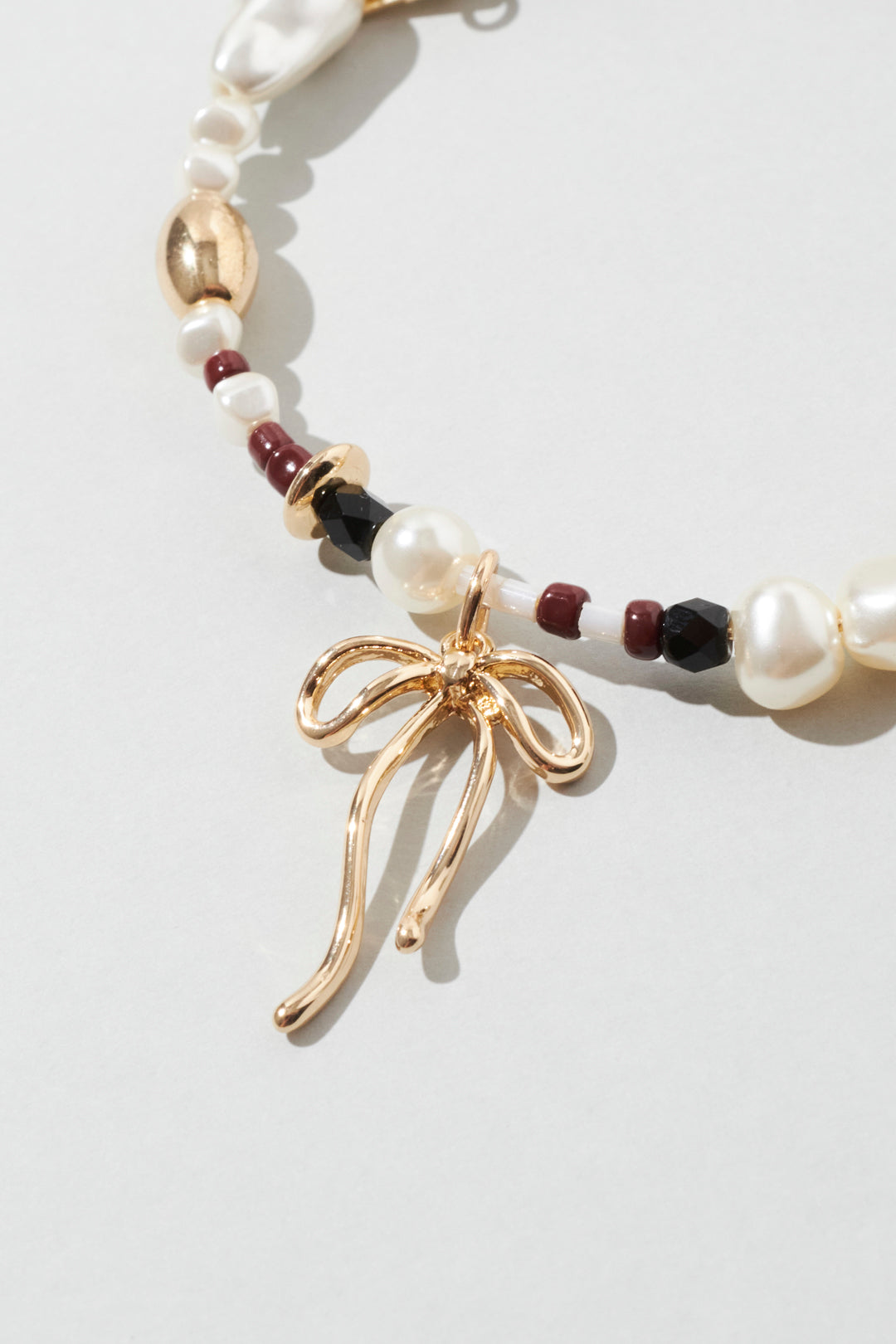 GOLDY multi bead bangle [BLACK/BROWN]