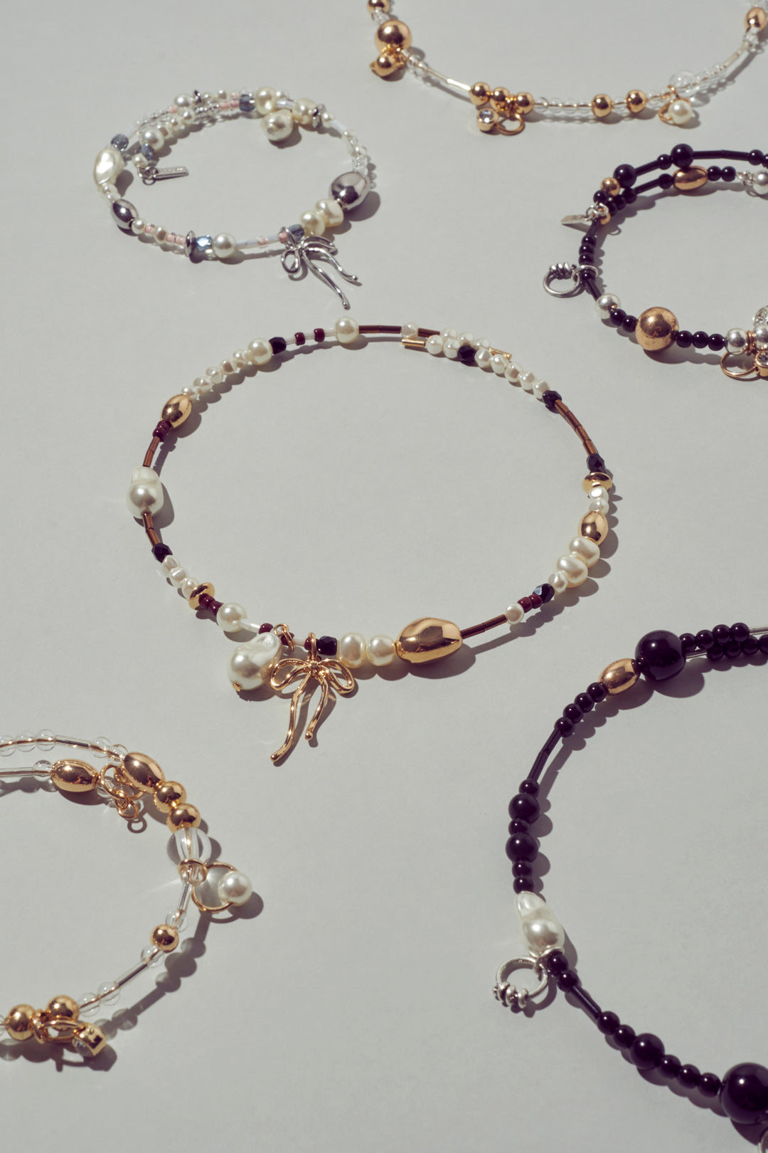 GOLDY multi bead bangle [BLACK/BROWN]