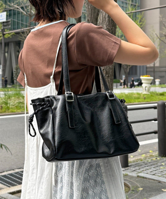 CPCM Drawstring Leather Boston Bag - Image 1