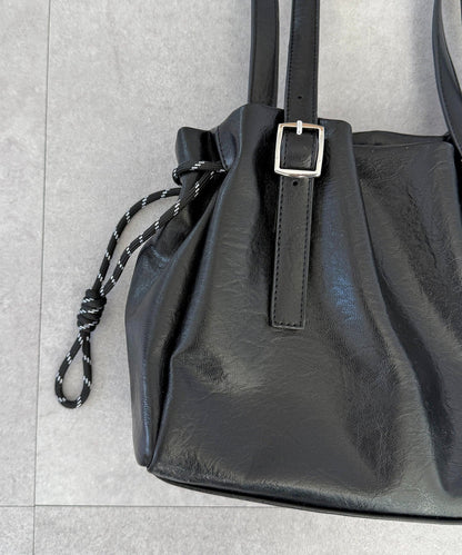 CPCM Drawstring Leather Boston Bag - Image 13