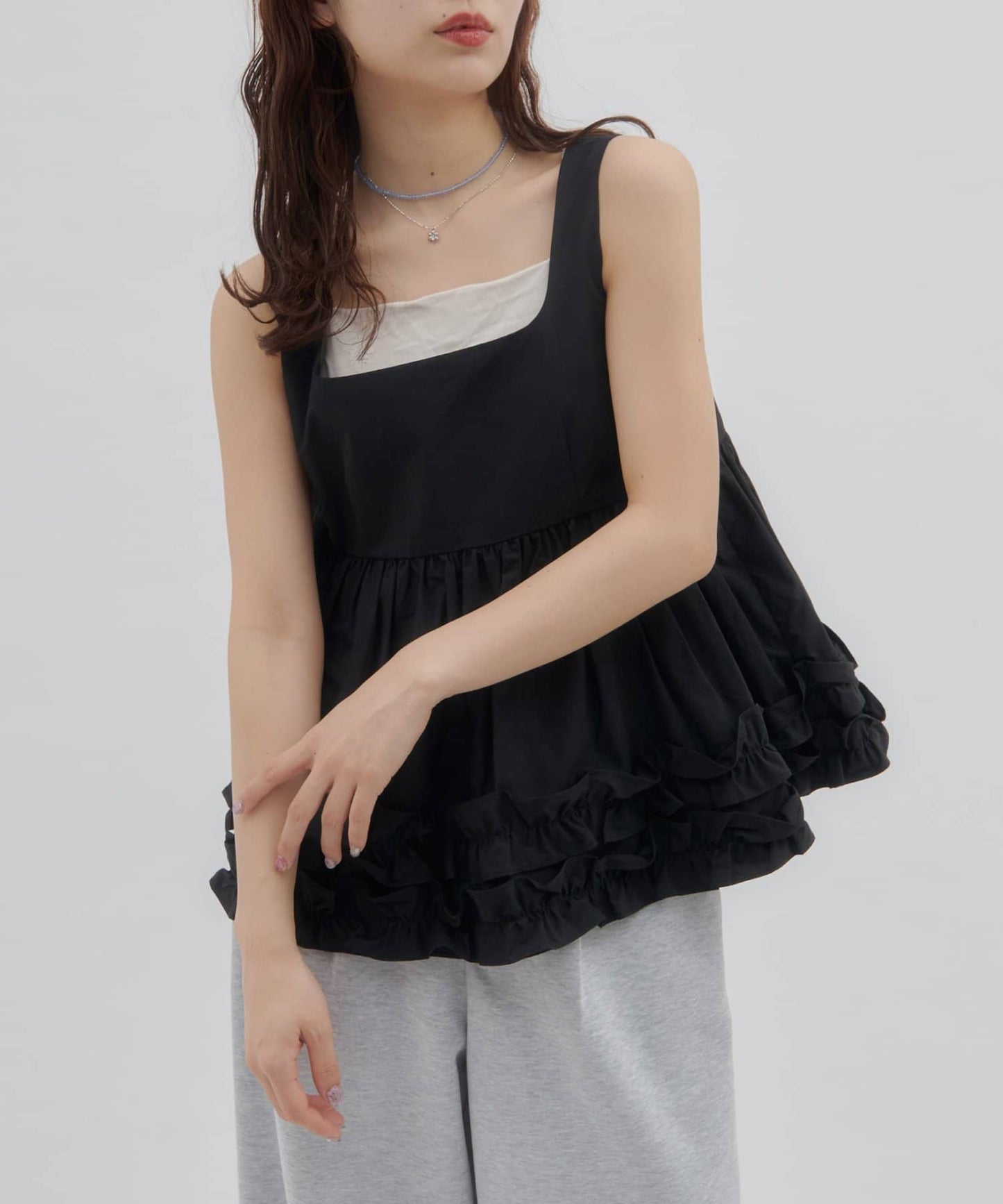 umm. by DISCOAT Frill hem sleeveless blouse