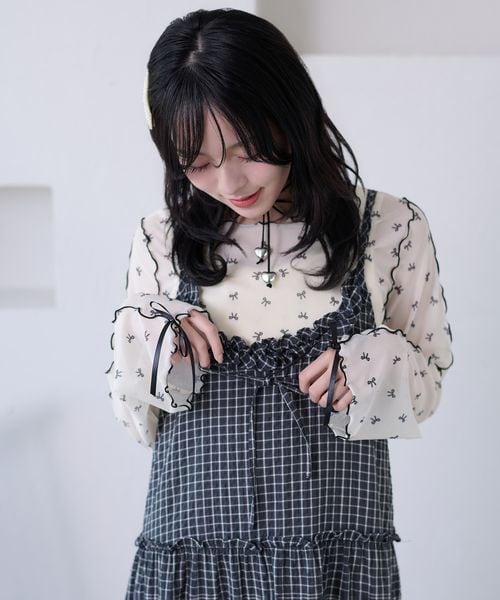 袖リボンシアーメロートップス
